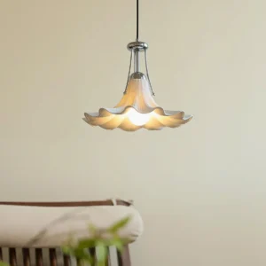 Petalia floral pendant light hanging in modern living room with beige walls and neutral Nordic home decor