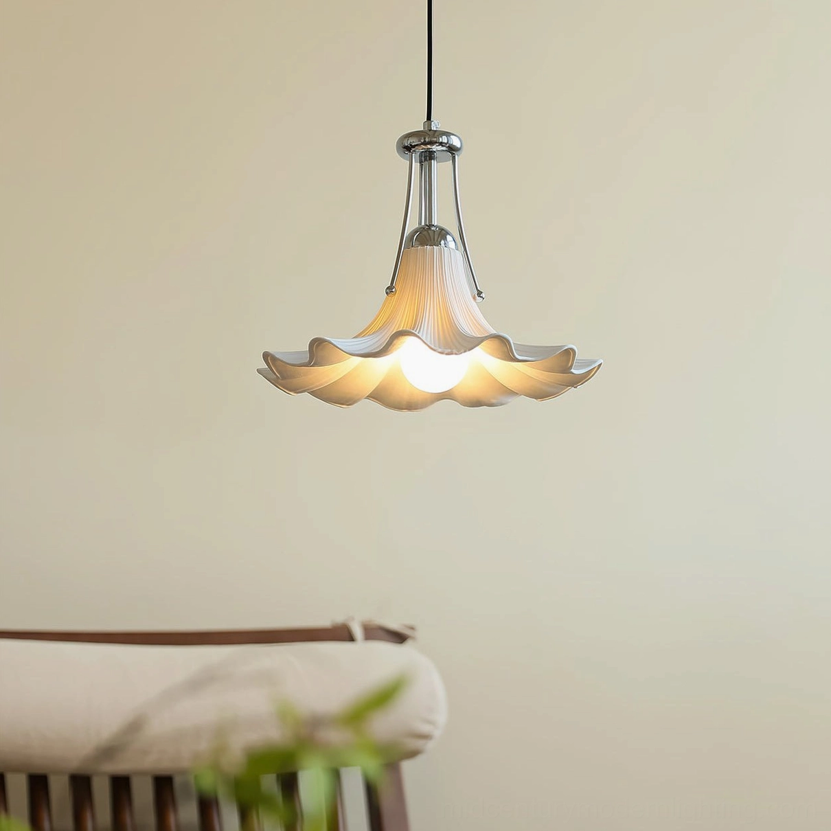 Petalia floral pendant light hanging in modern living room with beige walls and neutral Nordic home decor