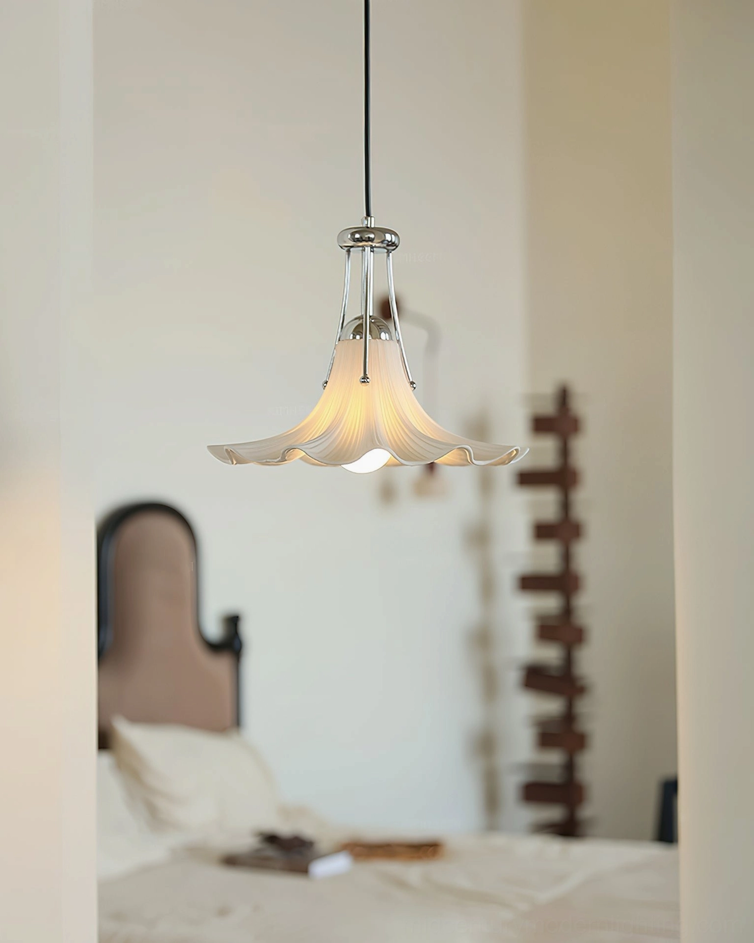 Petalia mid-century modern pendant light with scalloped ceramic design, overhead angle view
