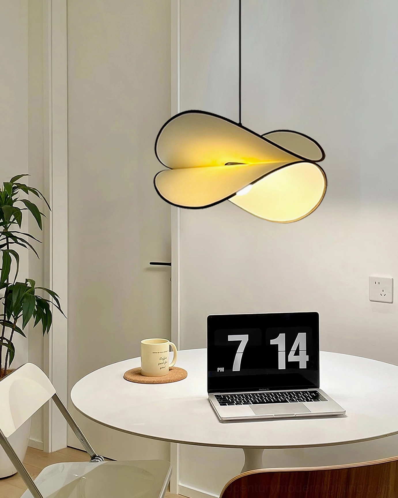 Petalo pendant lamp illuminated in home workspace and dining area casting warm ambient light