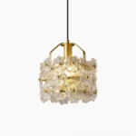 Petit Floral Glass Pendant Light with brass frame and delicate cast glass flower clusters in studio close-up