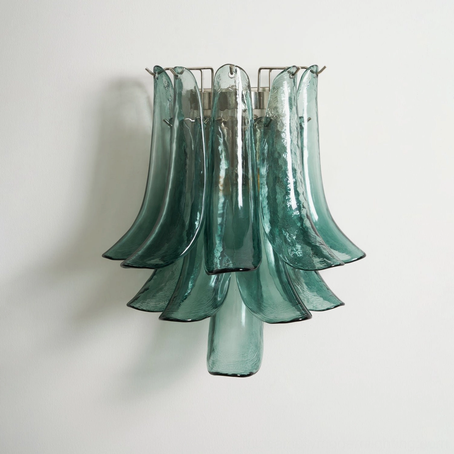 Petral sconce with artistic glass petal design, contemporary wall-mounted accent lighting