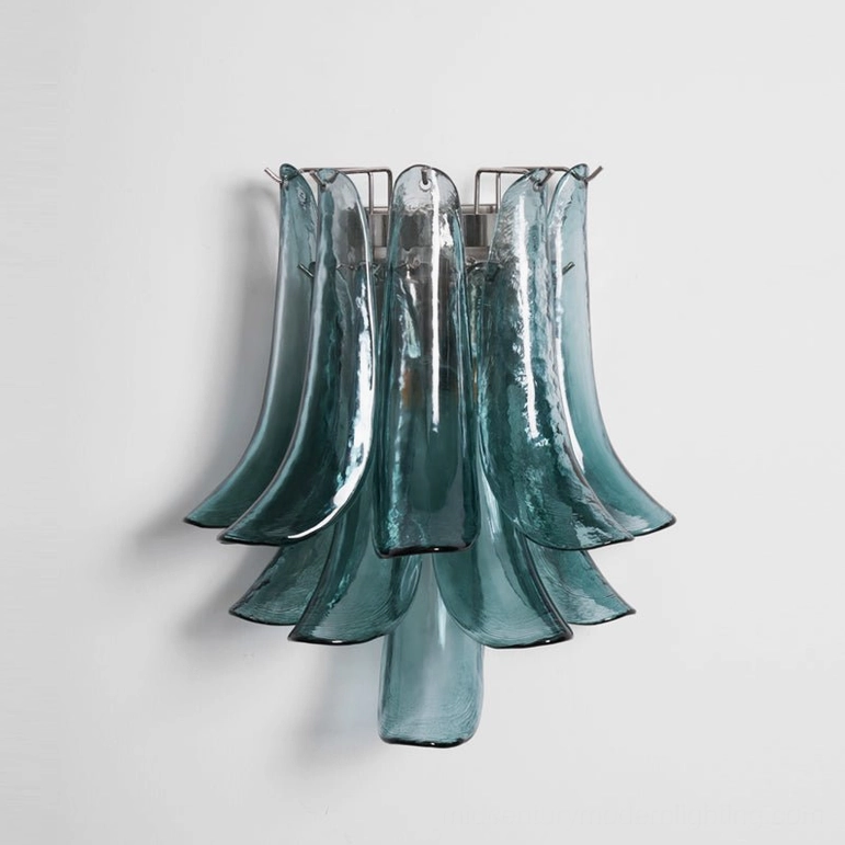 Petral wall sconce in rich deep teal translucent glass with layered petal structure, artistic sculptural form