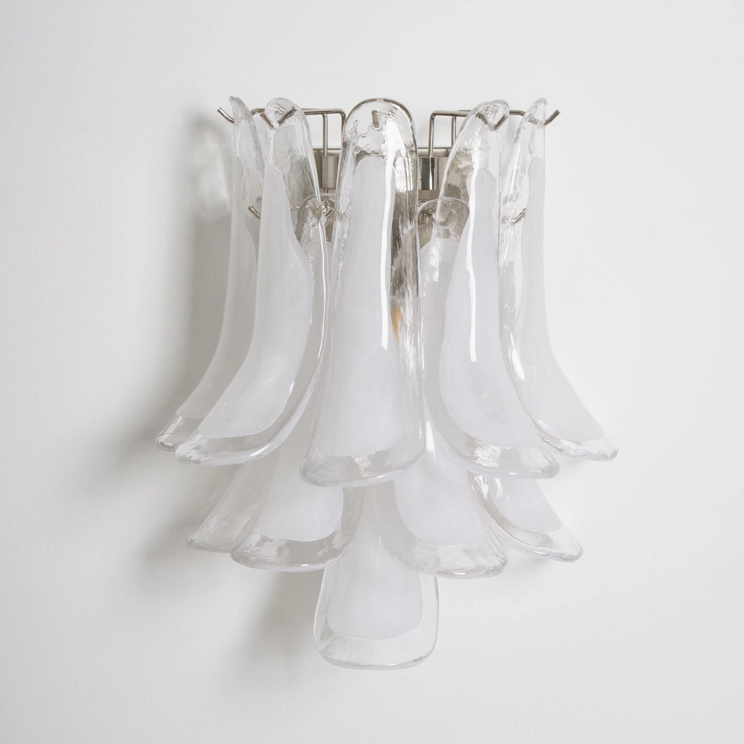 Petral wall-mounted sconce with frosted glass petals and nickel frame, contemporary fixture detail