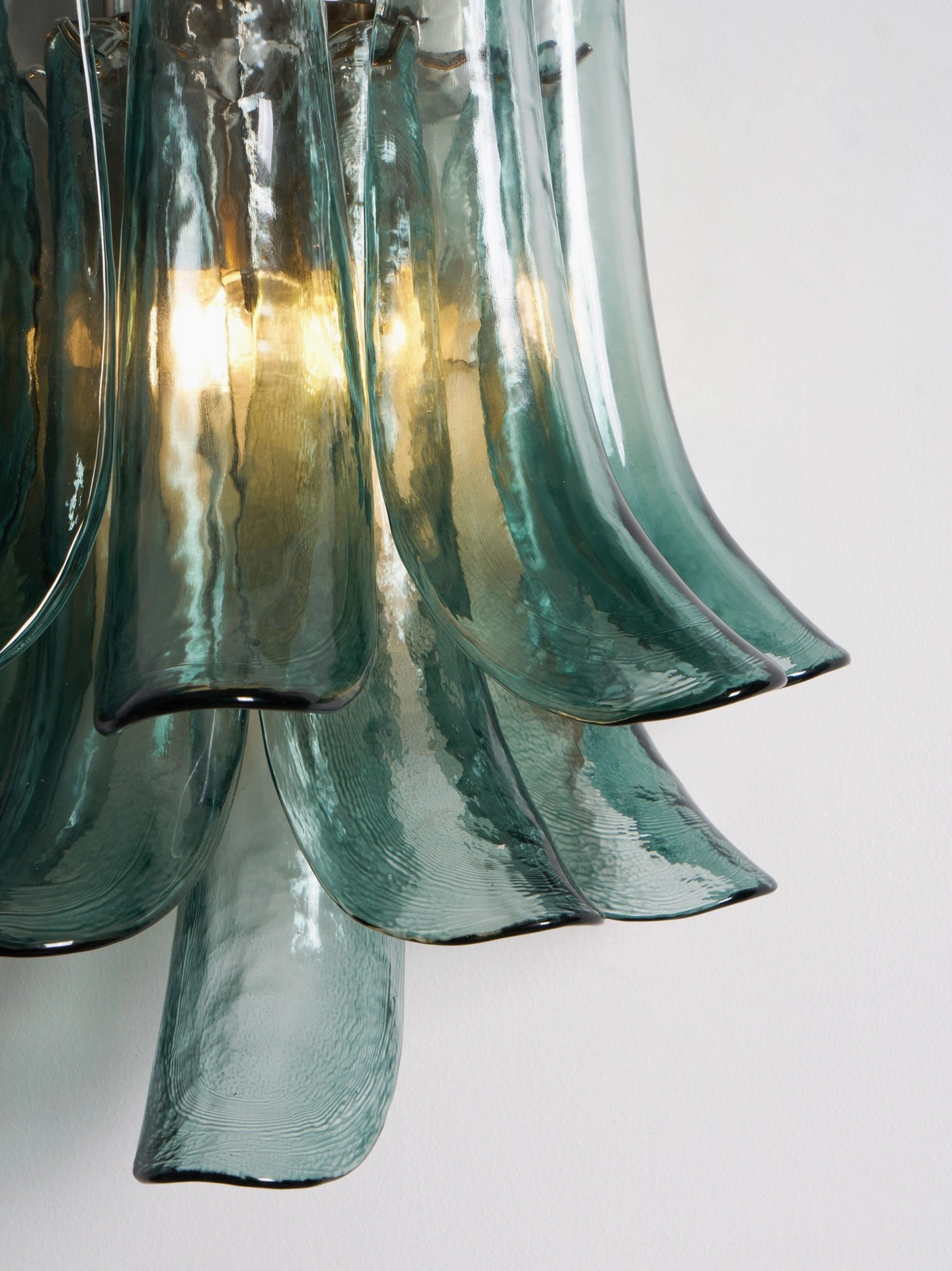 Petral wall sconce with gradient glass design, multi-color petal arrangement, sculptural lighting