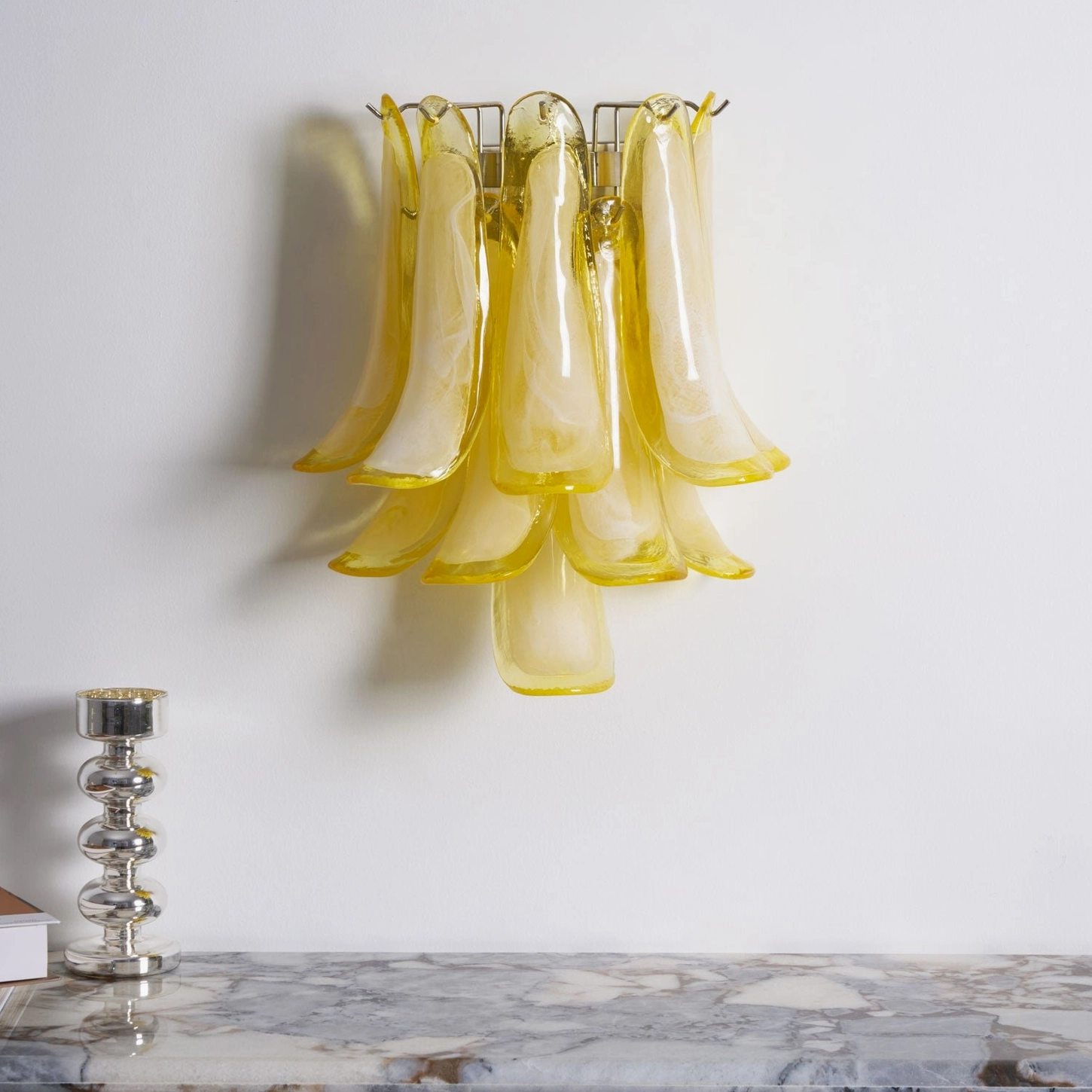 Petral wall-mounted sconce with organic glass petal design, mid-century modern aesthetic