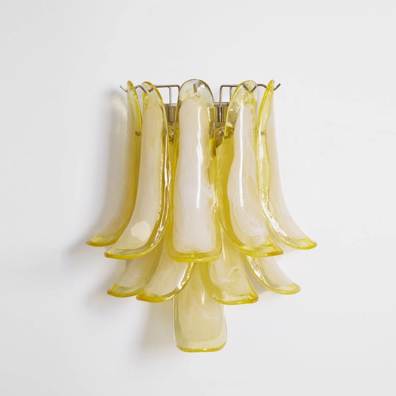Petral wall sconce with double-layer yellow opaque glass petals, sculptural hand-formed design, studio lighting