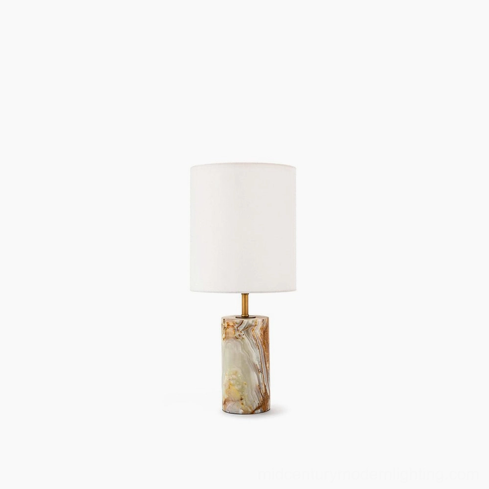 Pharos marble table lamp with onyx base and white linen shade - front view on white background