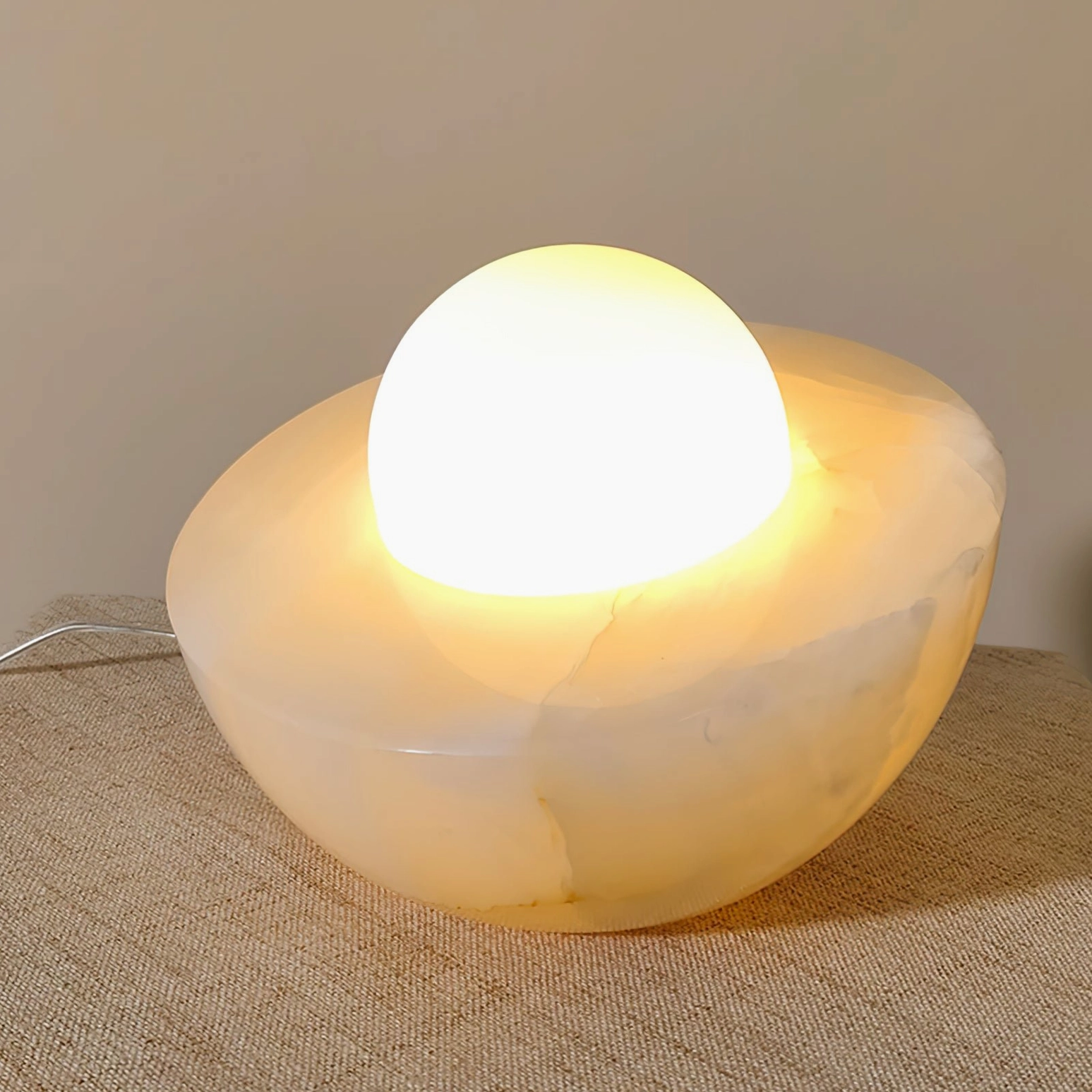 Piccola mid-century modern table lamp marble base with frosted glass sphere, contemporary lighting fixture detail view