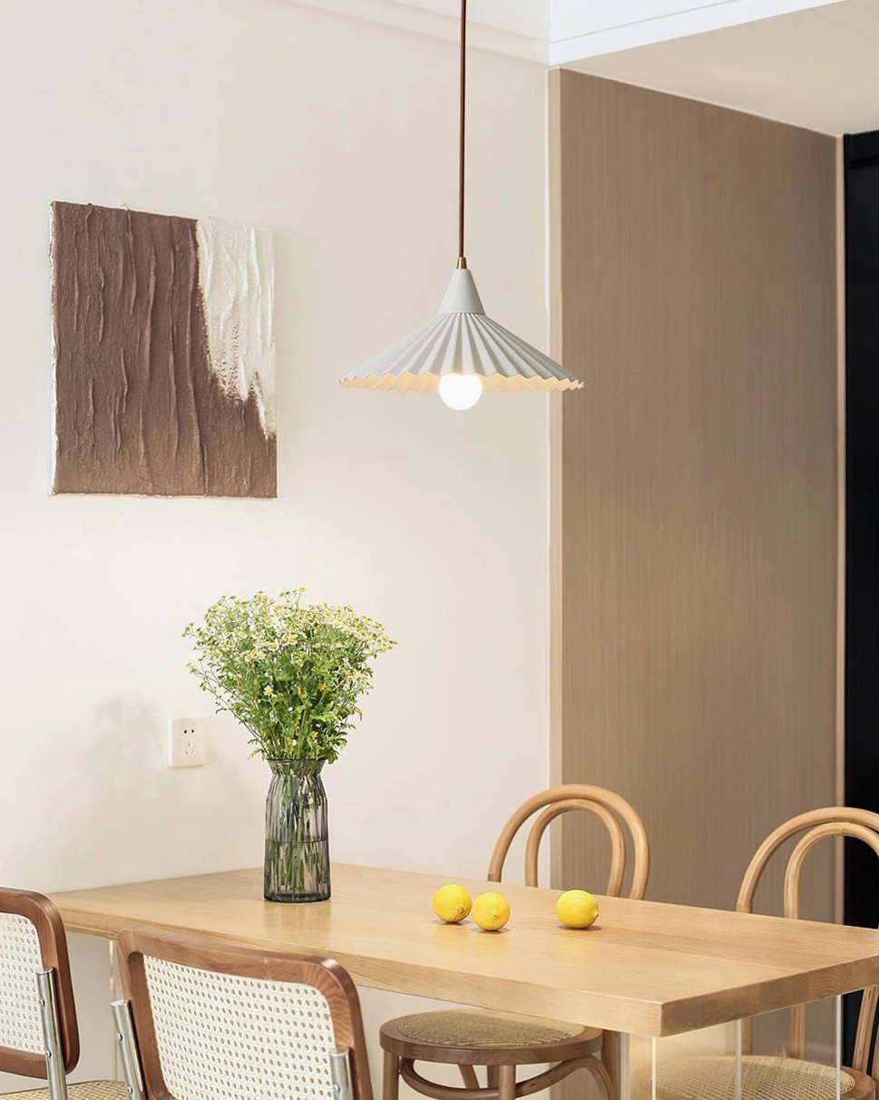 Pieghe mid-century modern pendant light with pleated metal shade detail and focused downward illumination