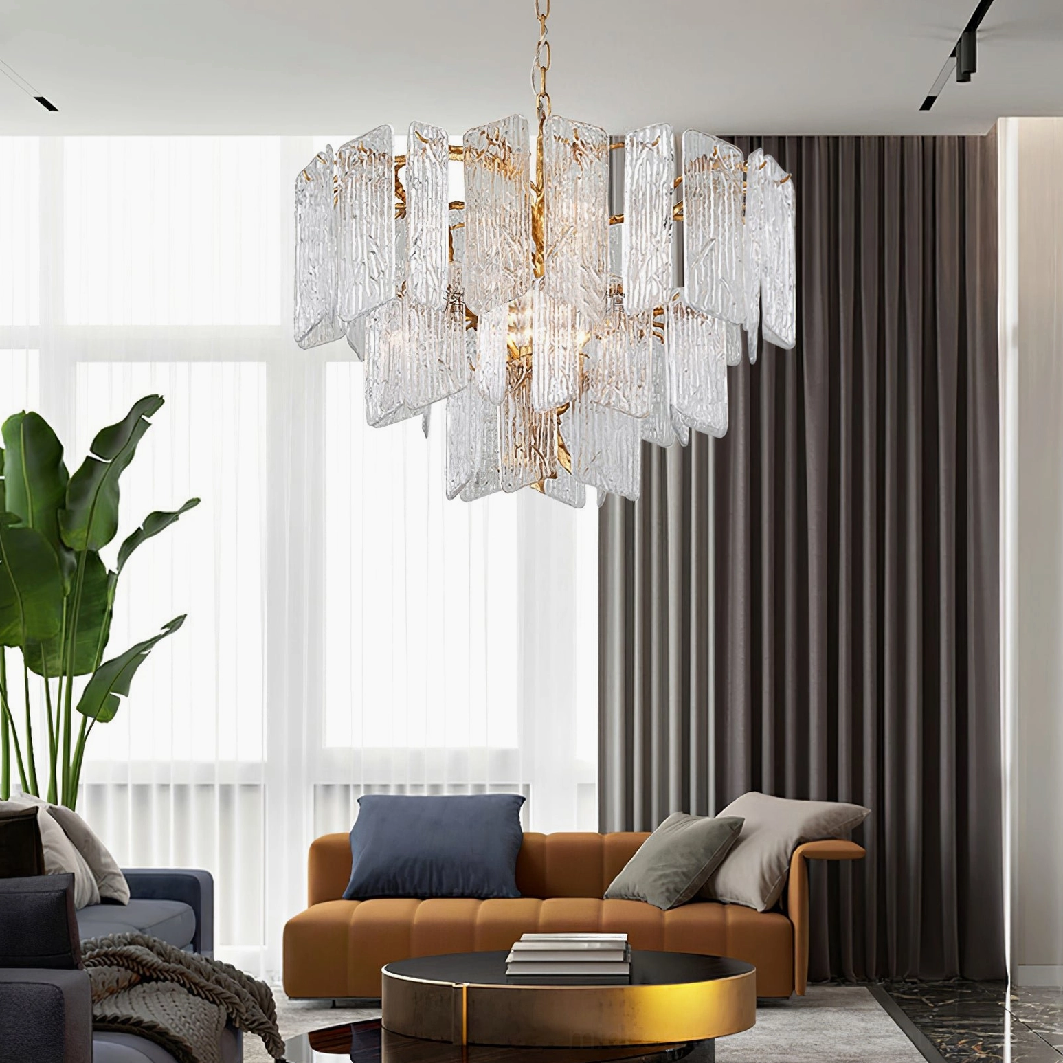 Piemonte tiered glass chandelier with layered panels in bright modern living room with natural daylight