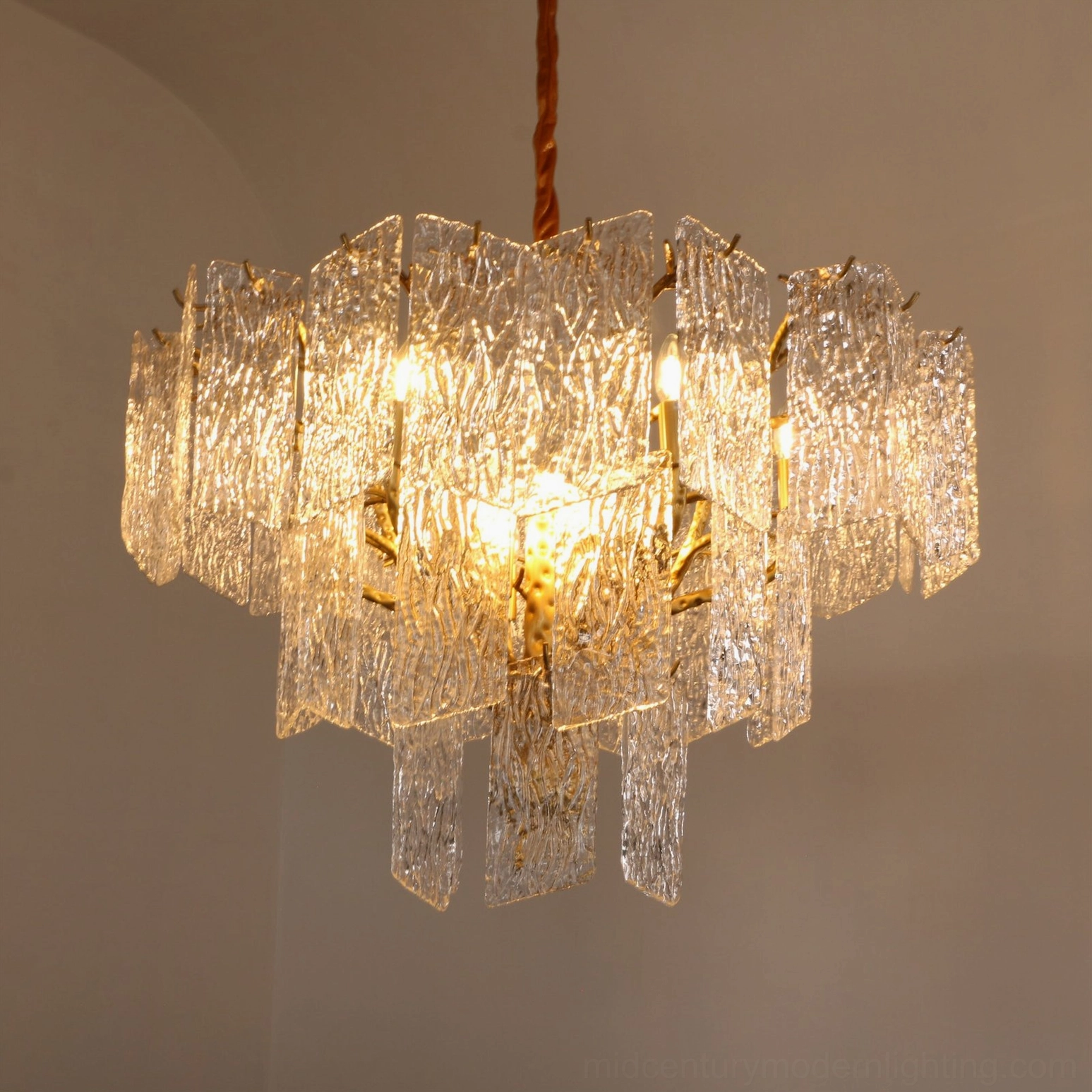 Piemonte crystal chandelier installed in contemporary interior showcasing glass crystal panels and lighting effect