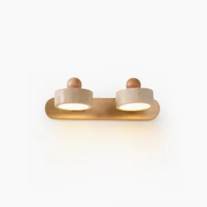 Piero 2-head travertine wall lamp front view, minimalist studio display with warm natural stone