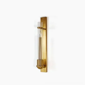 Pike brass wall sconce close-up front view with polished gold metal frame and clear glass cylinder