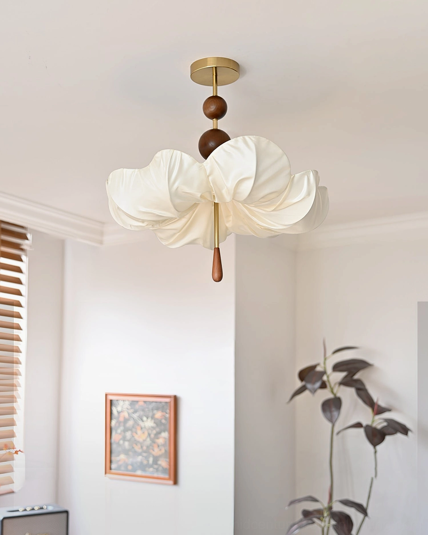 Pinctada fabric ceiling light installed in residential room with louvered window and wall art, side view