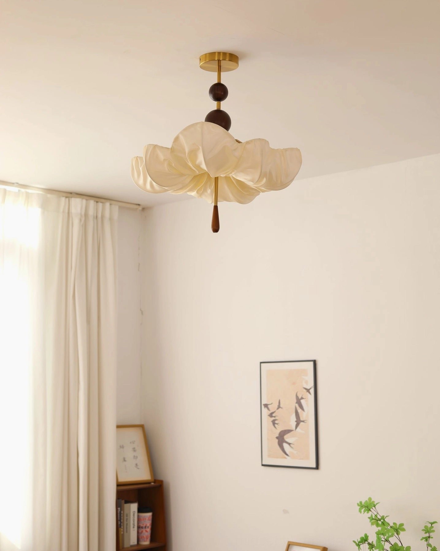 Pinctada fabric ceiling light unlit in residential space with sheer curtains, soft romantic style three-quarter view
