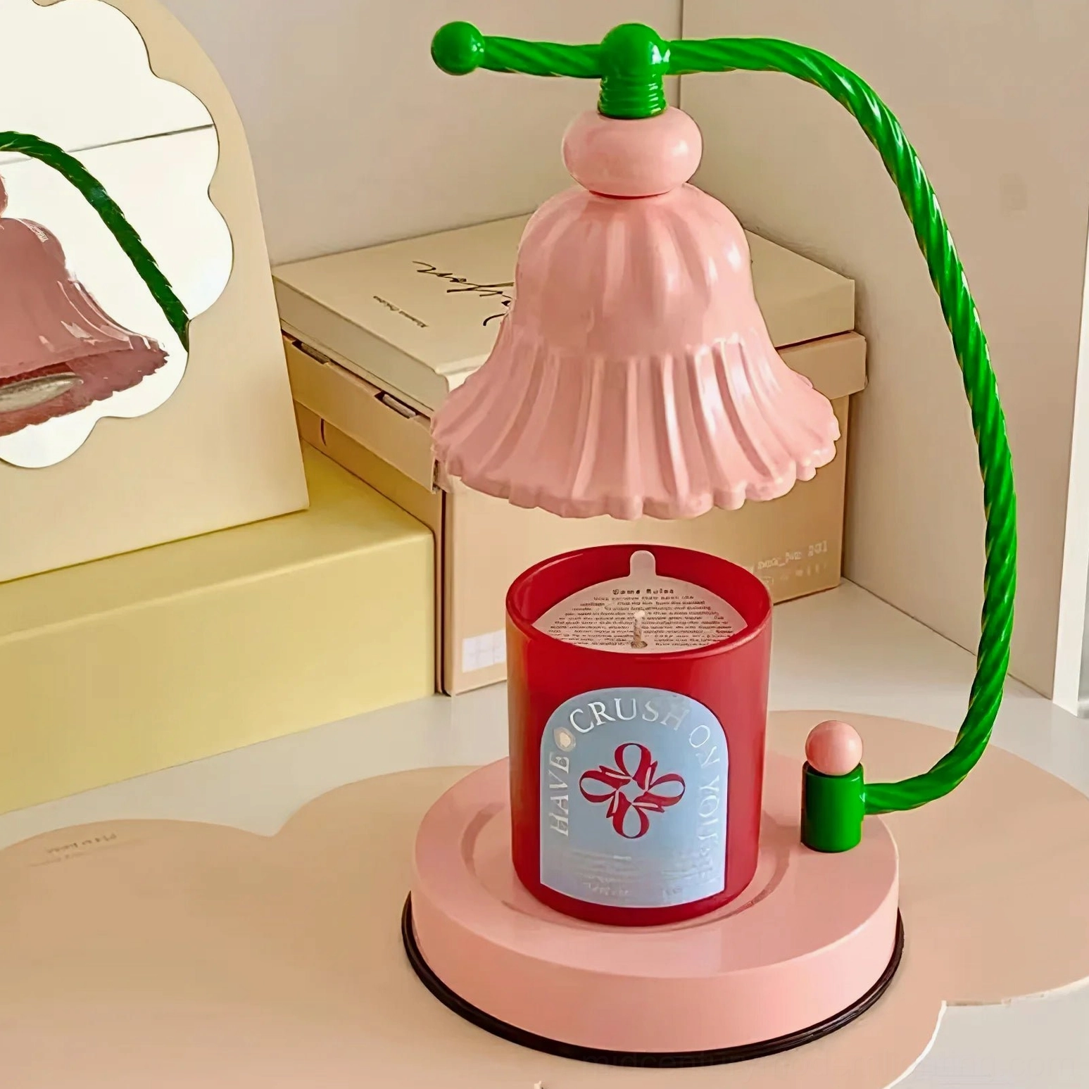 Blush pink table lamp with graceful ceramic shade and metal base for mid-century modern interiors