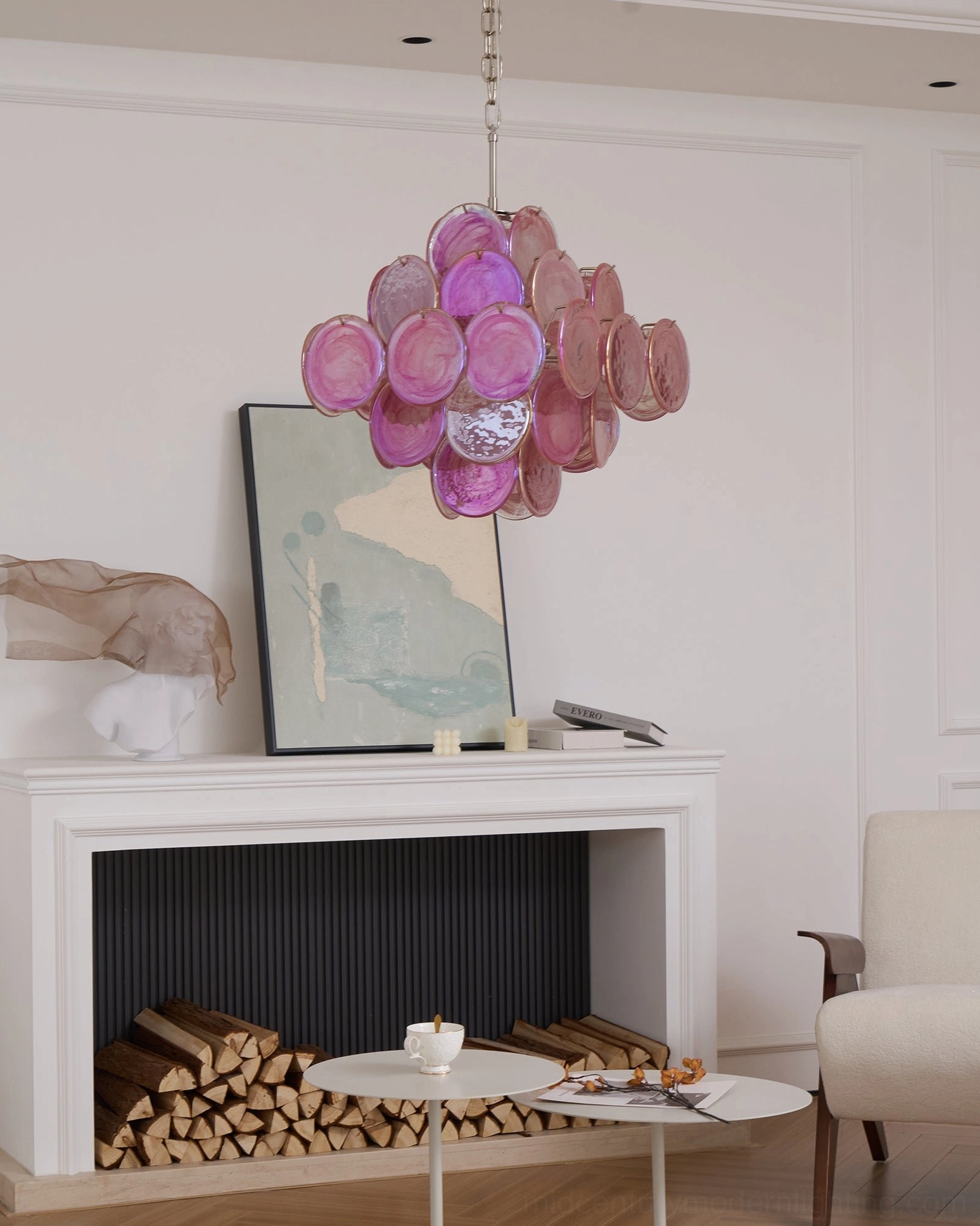 Pink disc Murano chandelier contemporary pendant lighting suspended in modern interior design setting