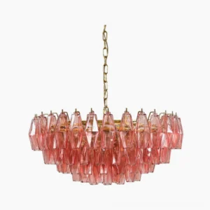 Pink polygon faceted glass chandelier with gold metal suspension chain and layered glass prism design, front studio view