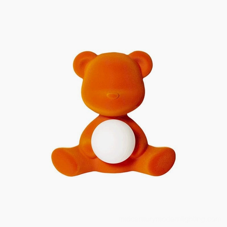 Pink teddy bear table lamp glowing display illustrating light diffusion