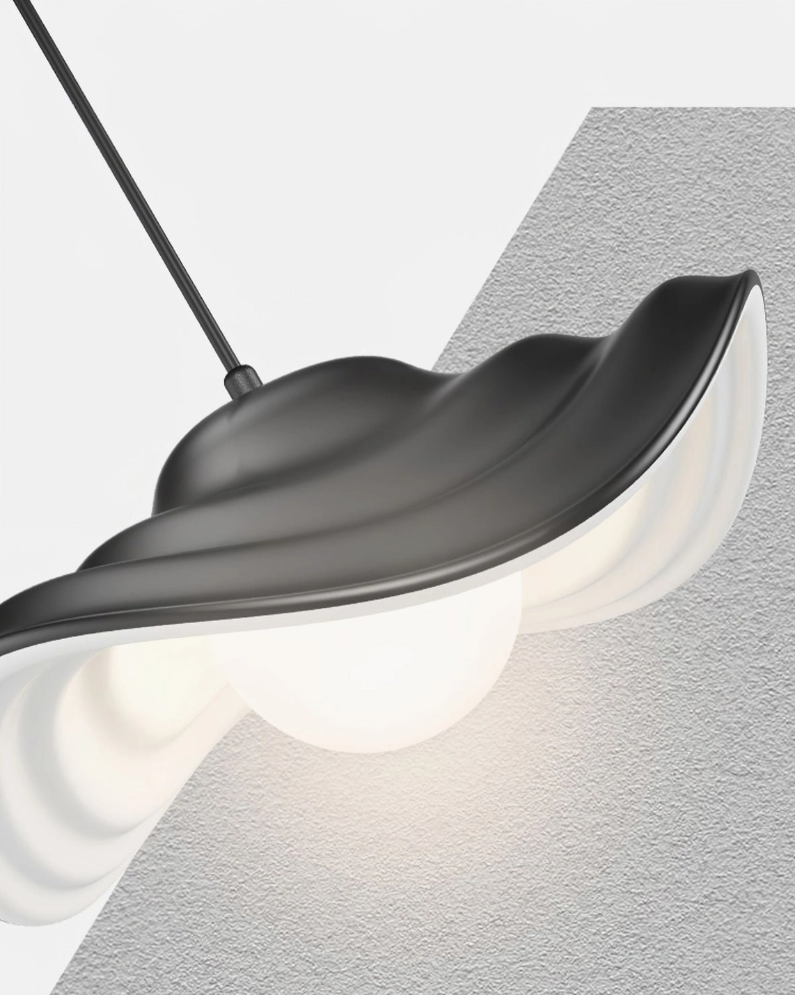 Pink blush wavy pendant light creating warm ambient illumination in modern residential interior with contemporary home furnishings