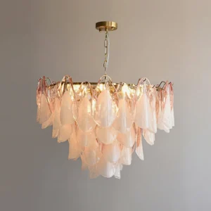 Pink and white ombre glass petal chandelier with gold brass frame, modern indoor display