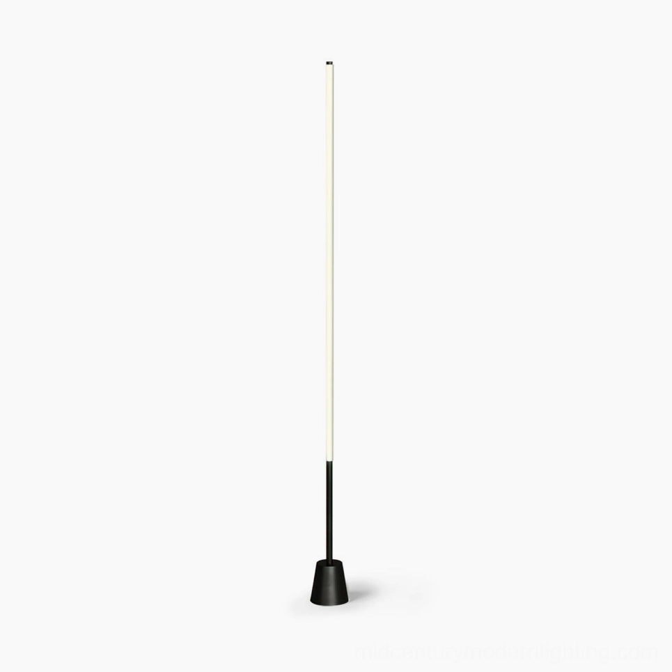 Pipeline minimalist LED floor lamp with matte black conical base against white background, frontal studio view showcasing clean geometric design