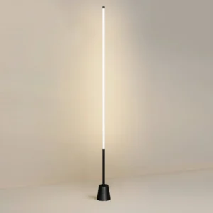 Modern black LED floor lamp in living space with warm glowing acrylic diffuser, contemporary interior styling
