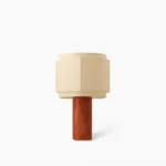 Pipito red travertine table lamp with octagonal off-white fabric shade, front view on white background