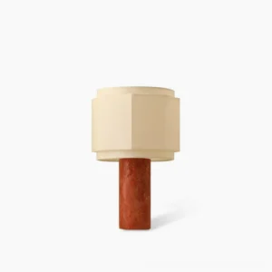 Pipito red travertine table lamp with octagonal off-white fabric shade, front view on white background
