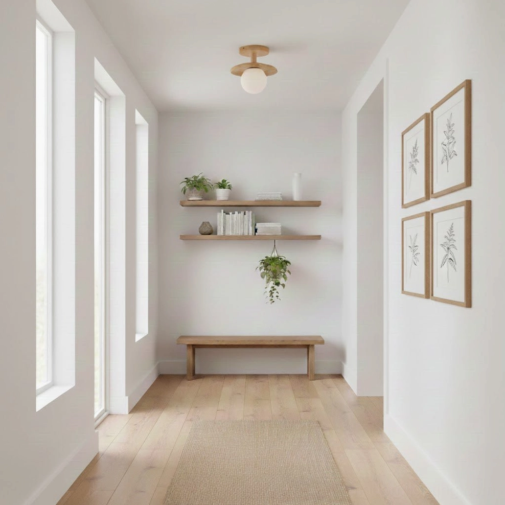 Plafon natural ash wood ceiling lamp illuminating bright minimalist residential hallway with framed art and floating shelves