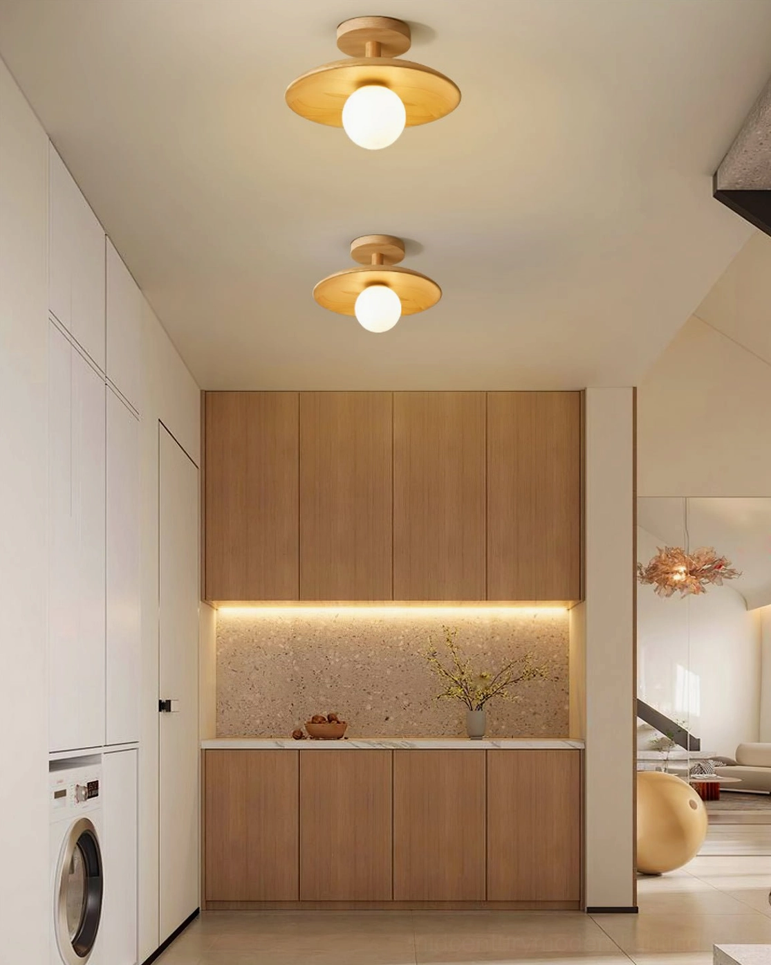 Plafon large diameter ceiling fixture in living room providing broader ambient light coverage