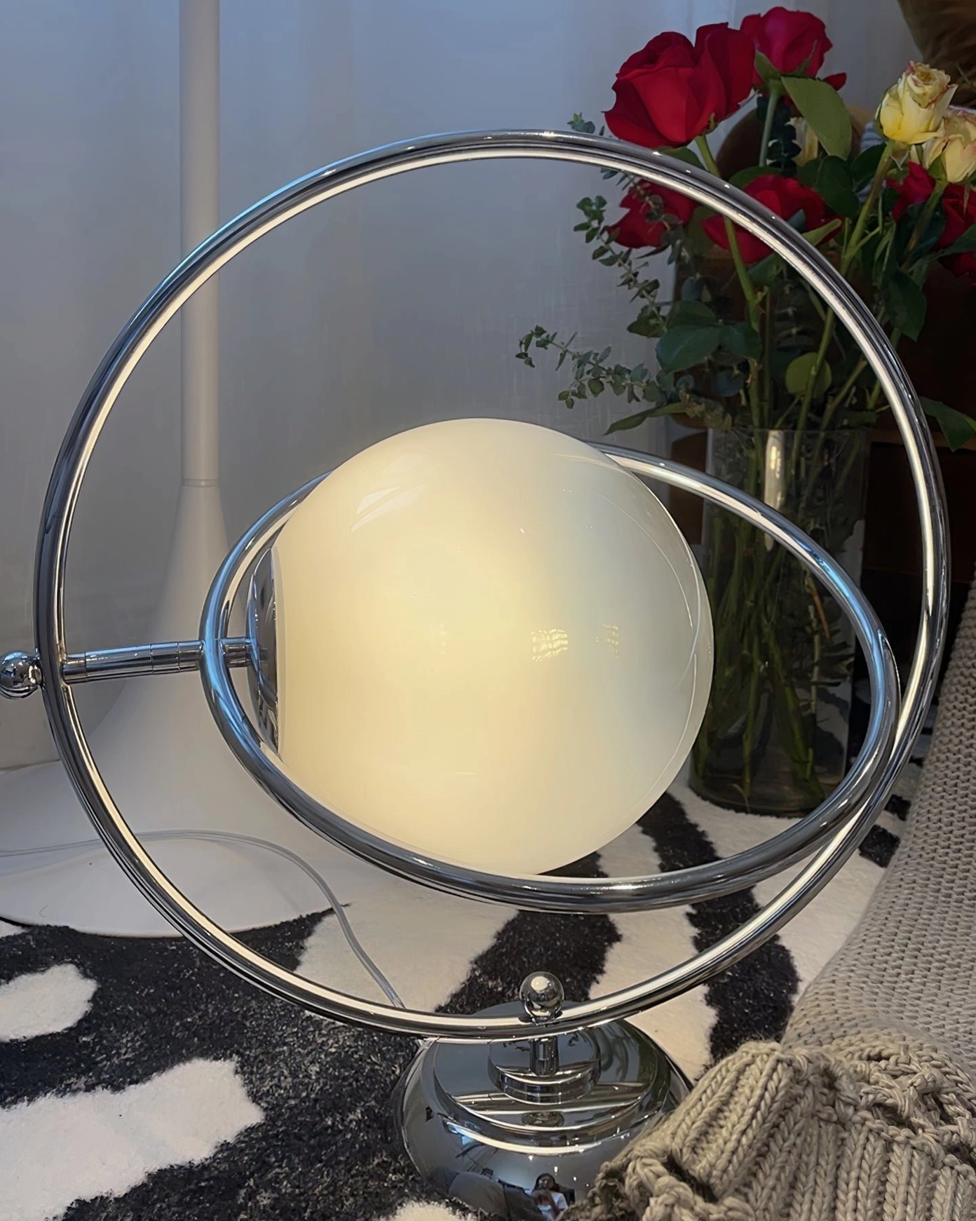 Modern planet table lamp with frosted white glass globe and metal base structure