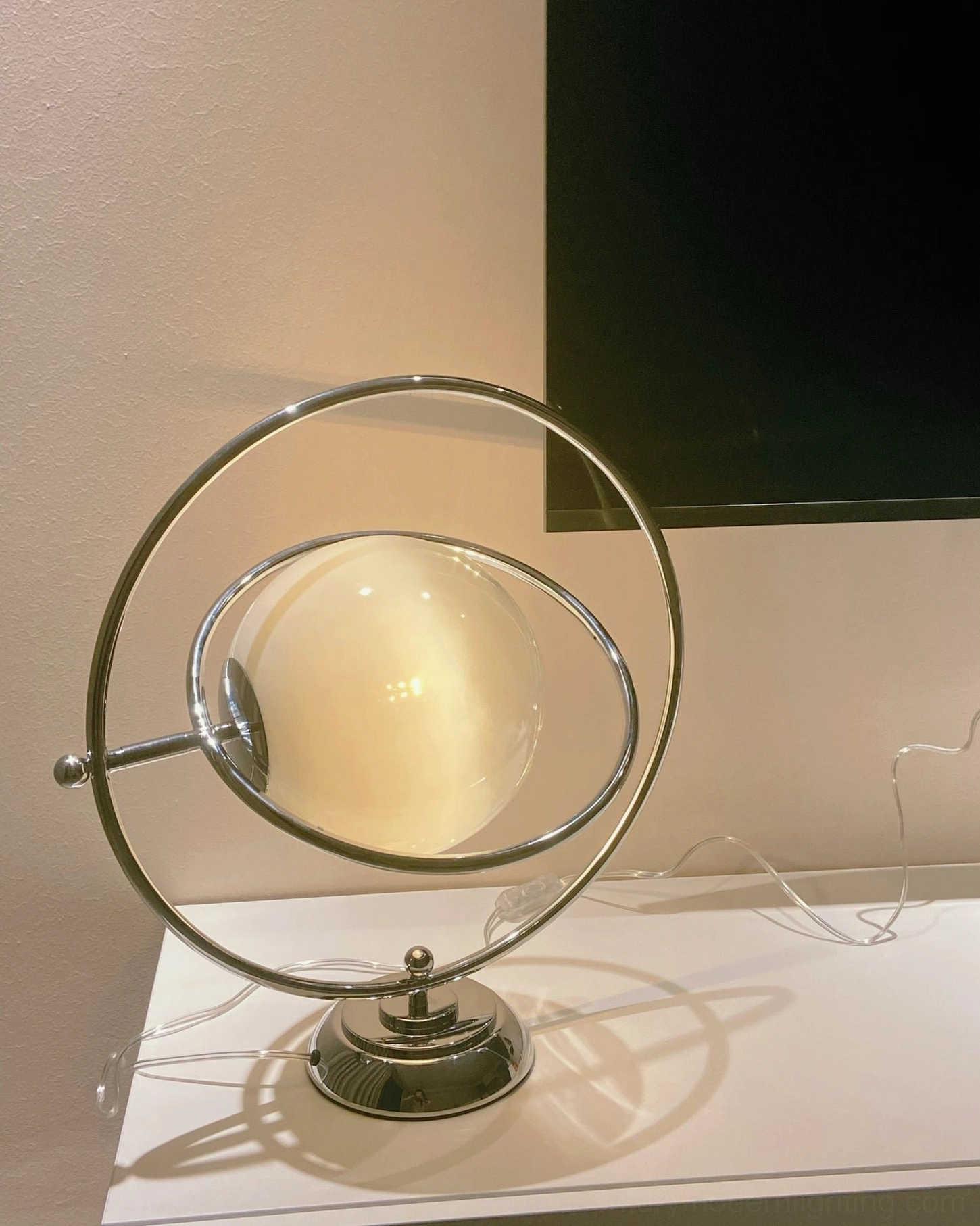 Planet lamp frosted white glass globe with polished chrome ring structure