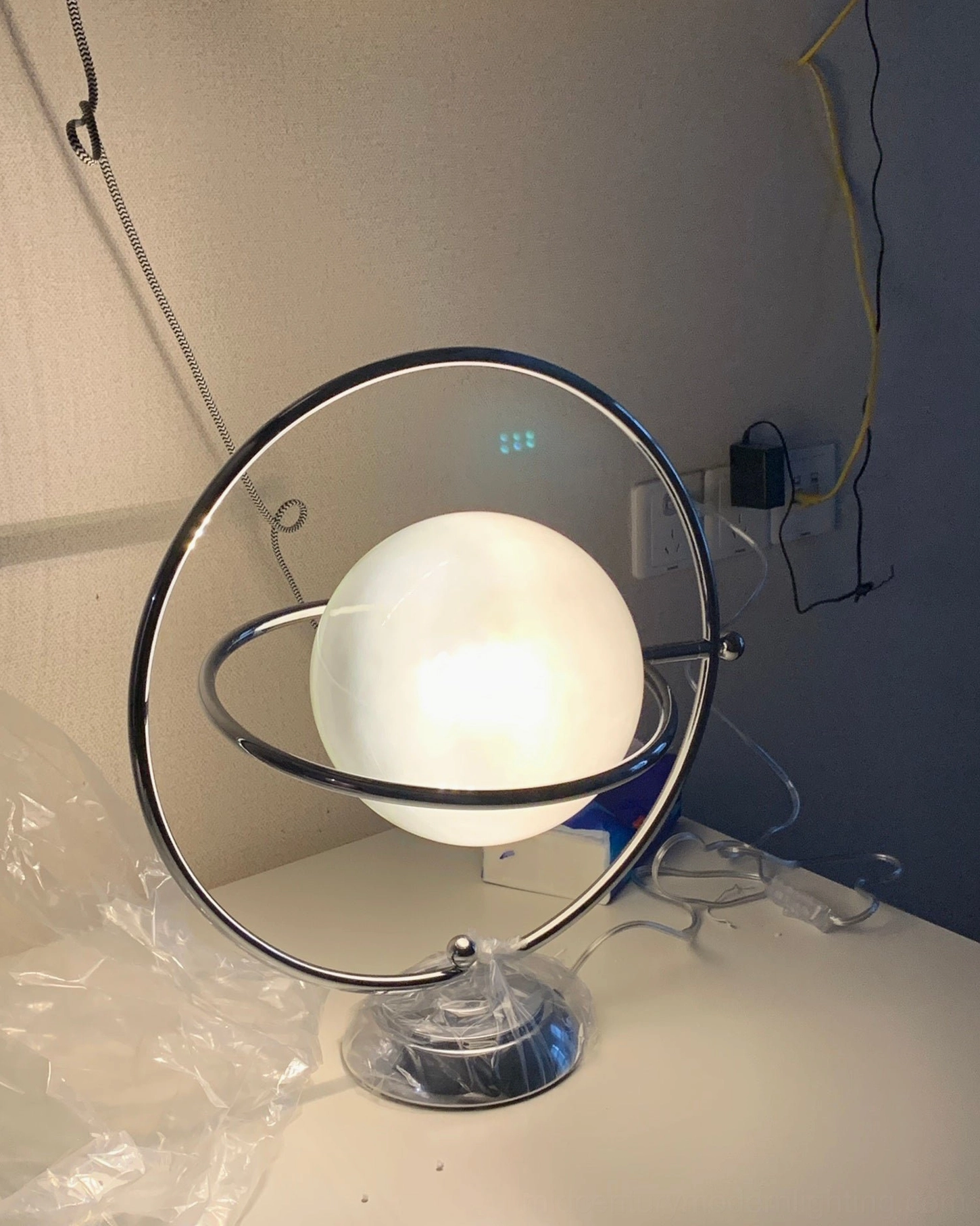 Planet lamp minimalist design philosophy contemporary geometric lighting fixture