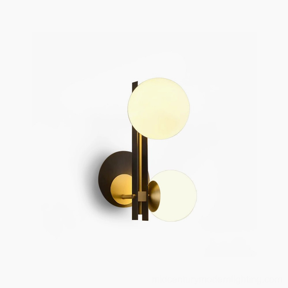 Planeta dual globe wall sconce in black and brass finish, frontal studio view showing both frosted glass orbs