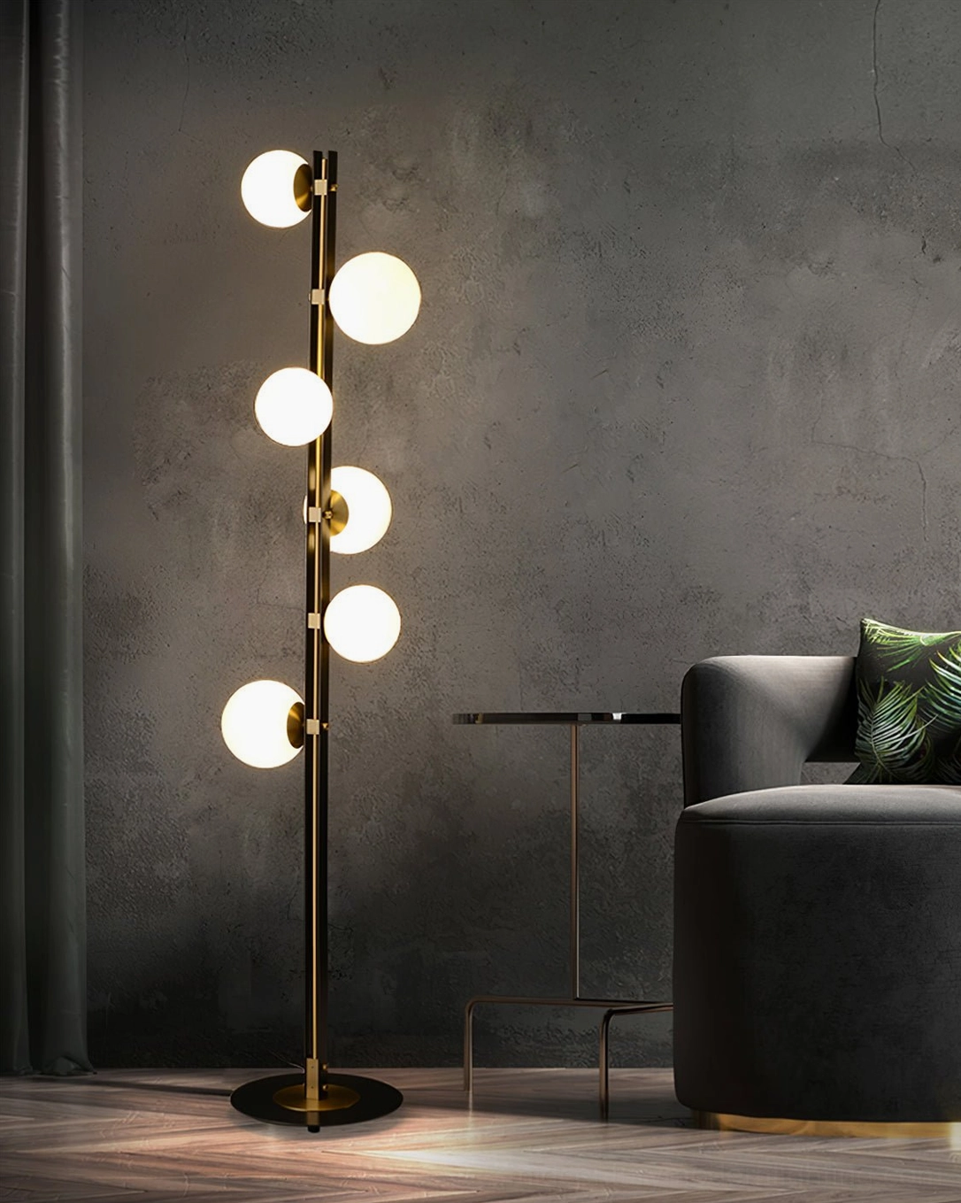 Planeta spherical floor lamp with dark fabric sofa and metal side table in modern living room