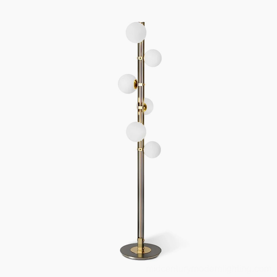 Planeta modern branch floor lamp with dual-tone brass and frosted white glass spheres in minimalist studio setting