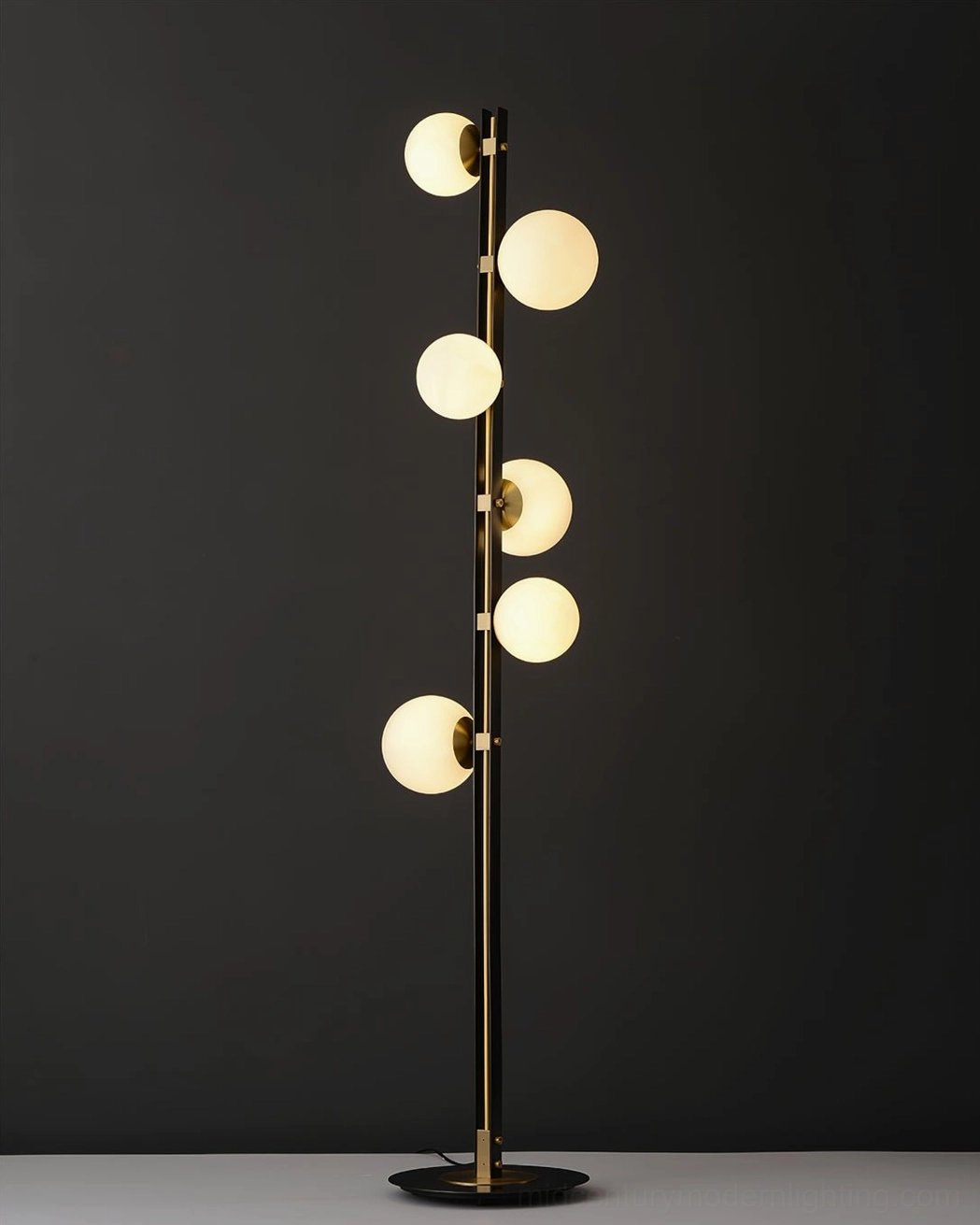 Planeta floor lamp warm glow illuminating minimalist interior with frosted glass diffusion