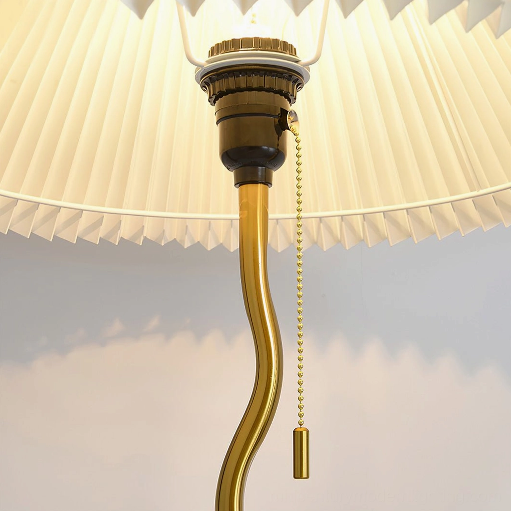 Back view of pleated floor lamp showing pleated shade construction and base stability