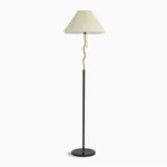 Pleated floor lamp with gold metal frame and black marble base, front view studio shot with minimalist wavy pole design