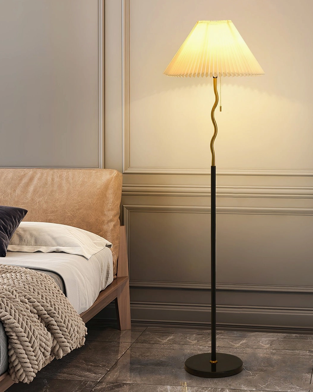 Black marble base and lower pole section of pleated floor lamp, showing sculptural wavy design