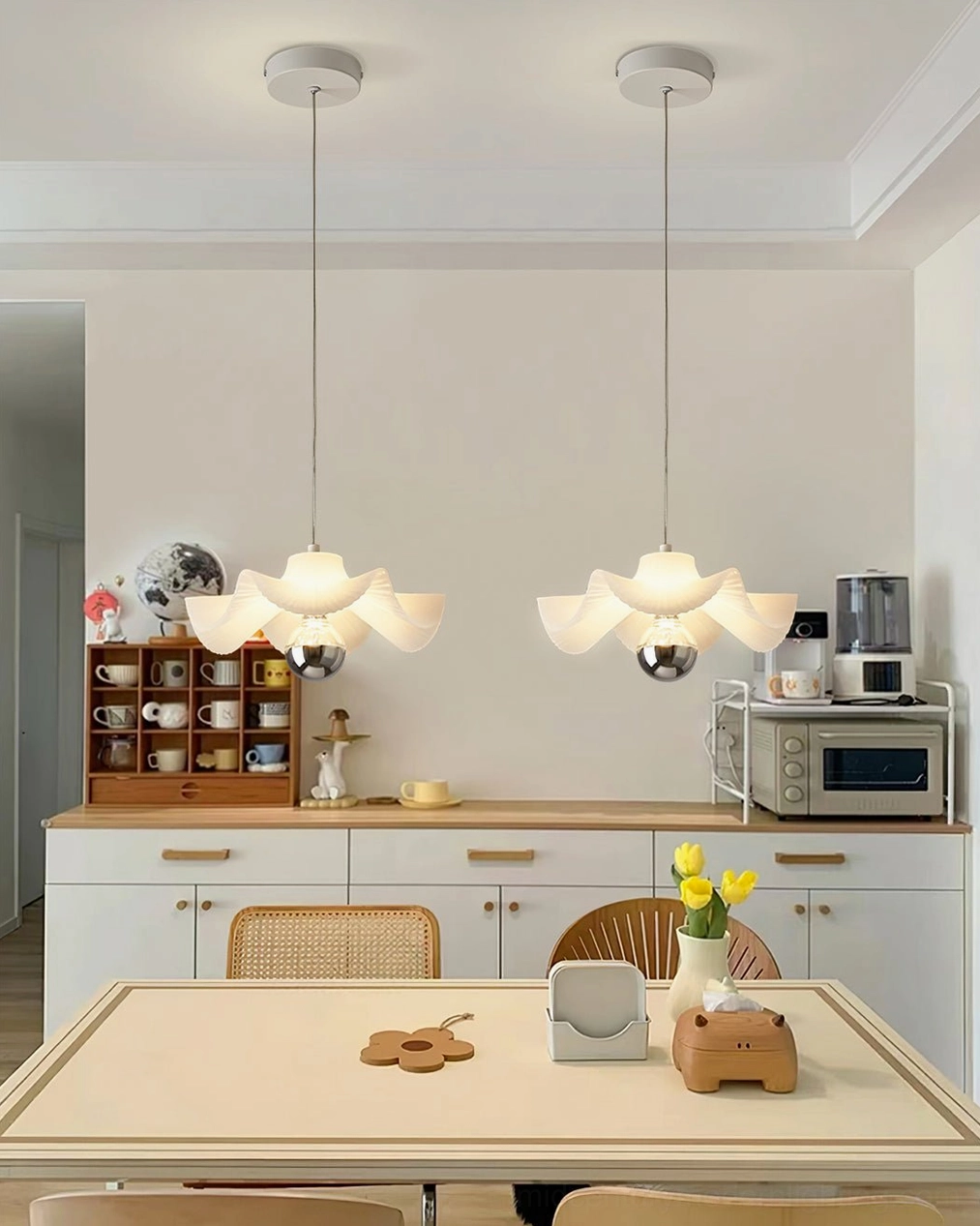 Sculptural pleated pendant lamp showing handcrafted fabric pleat construction