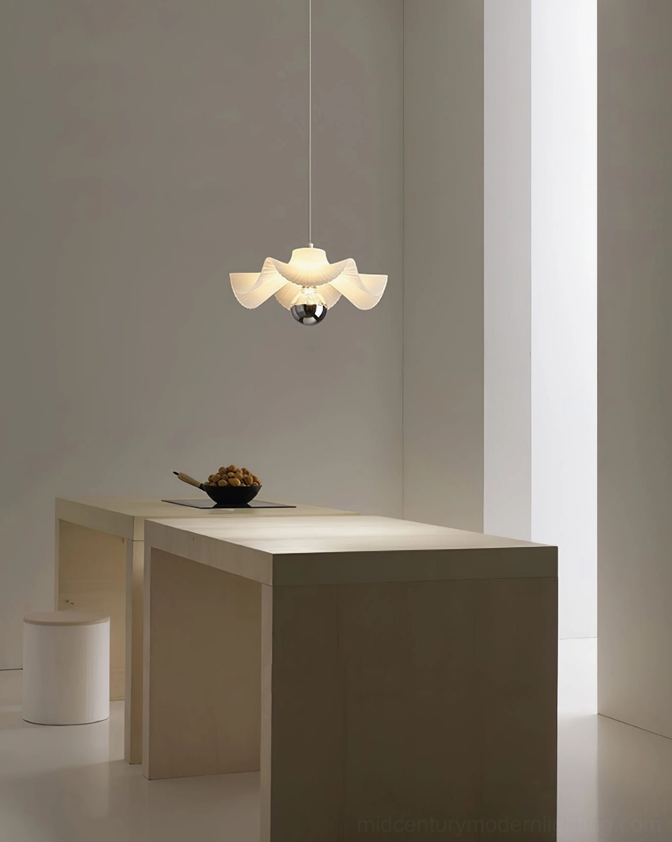 Sculptural pleated lamp fixture showing three-color temperature LED technology