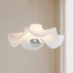 Modern pleated pendant lamp in beige interior setting, eye-level perspective showing fabric pleats and chrome base