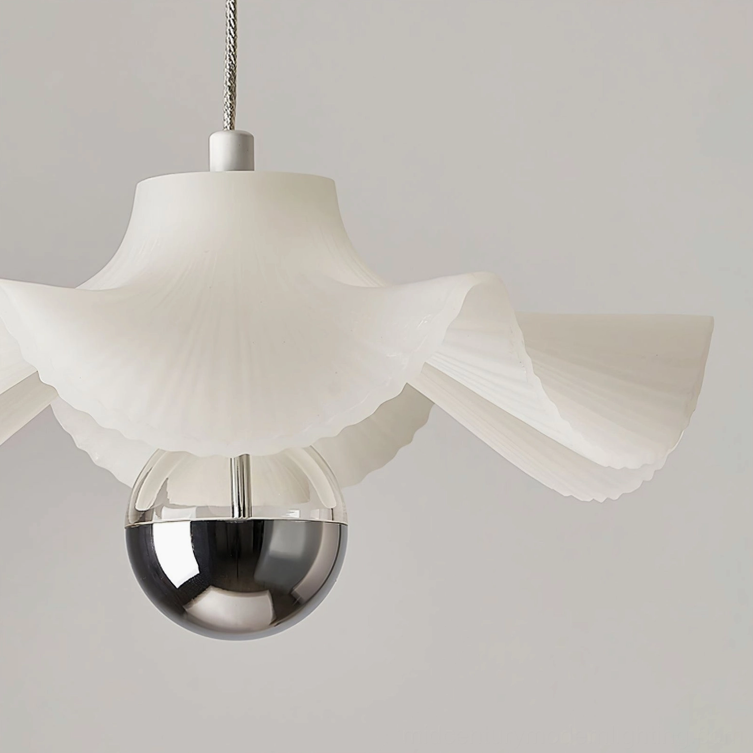 Pleated pendant lighting in modern home, showing warm neutral and cool light options