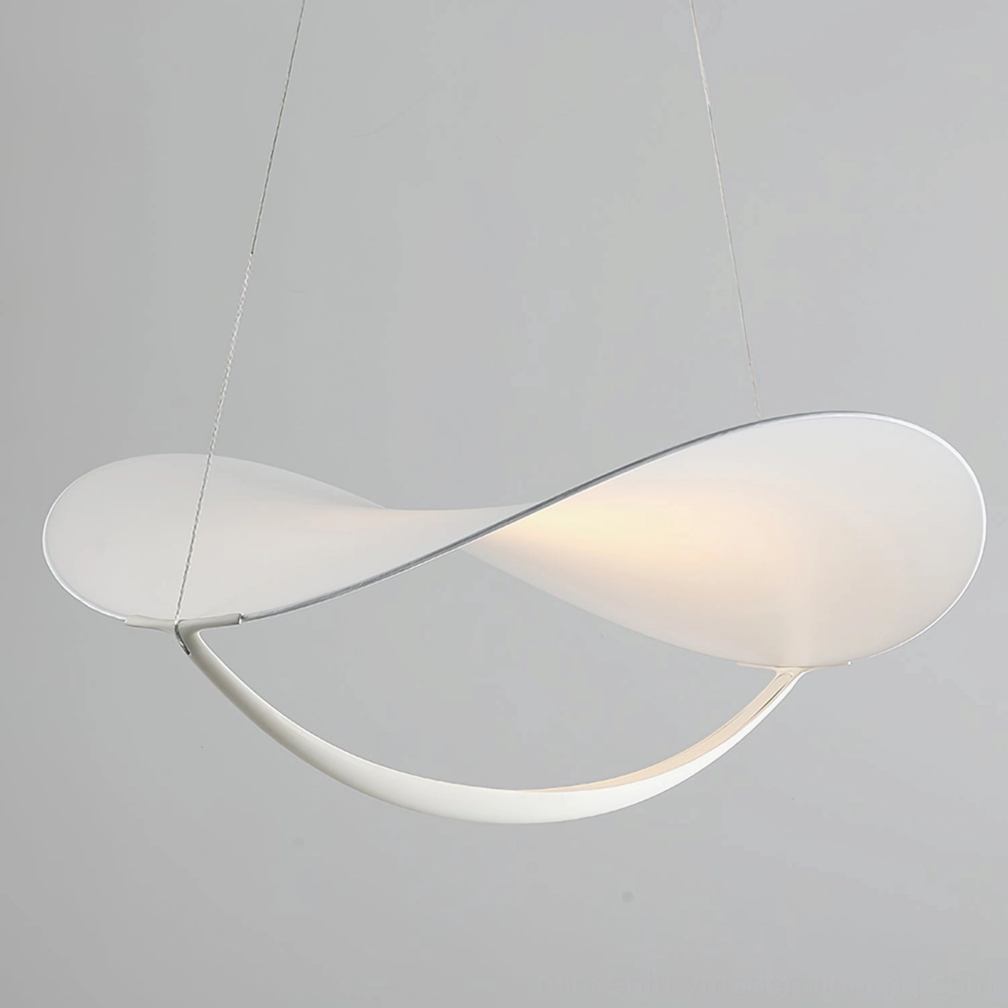 Modern sculptural pendant light curved white matte finish close-up detail