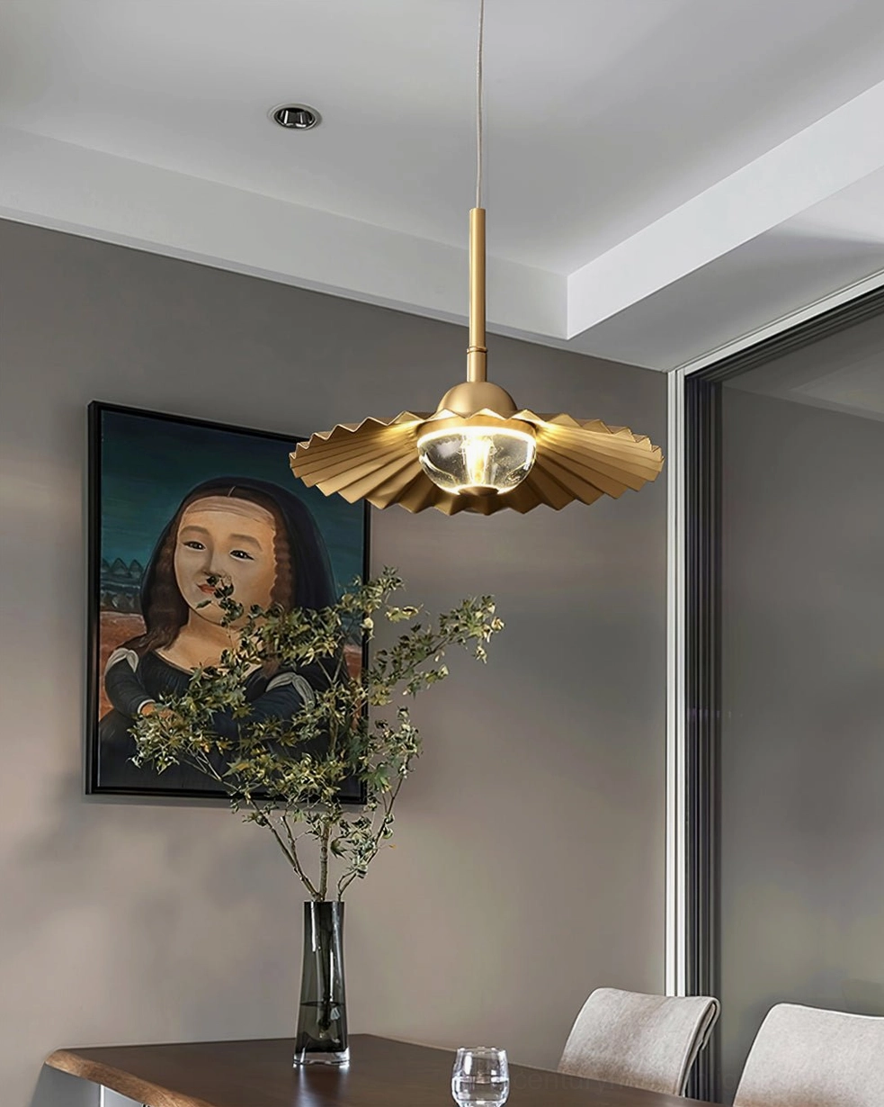 Single plié pendant lamp with integrated LED lighting and fan-shaped pleated shade in modern residential dining area