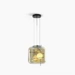 Plot pendant lamp with amber glass and black metal frame, front studio view showing dual warm bulbs