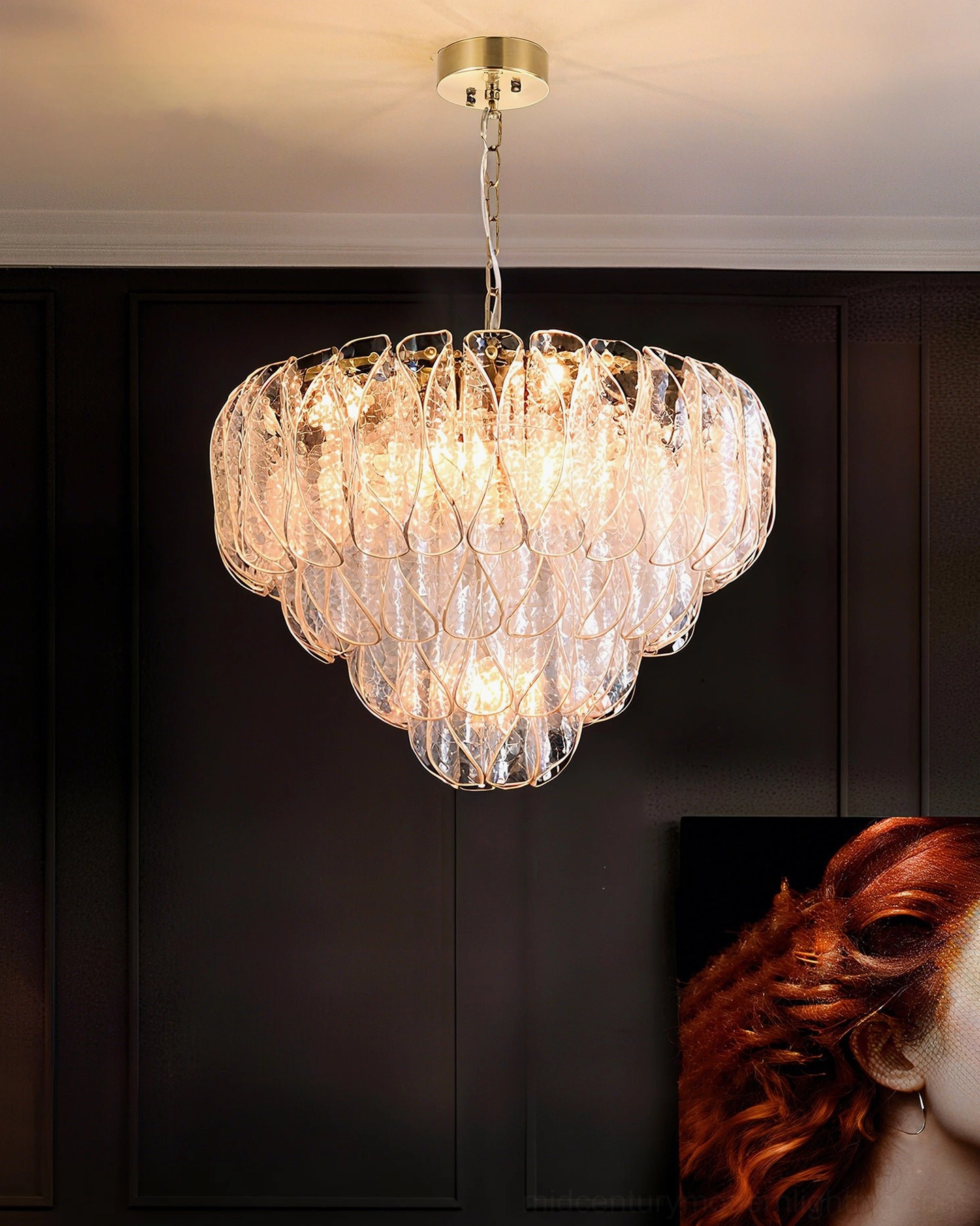 Poliedri tiered chandelier in high-end accent wall room with glam modern design and layered glass petals